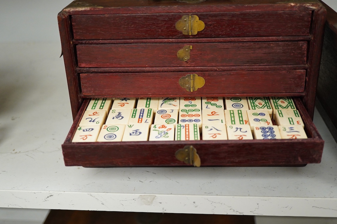 An early 20th century Chinese cased mah jong set, 20cm wide x 17cm high